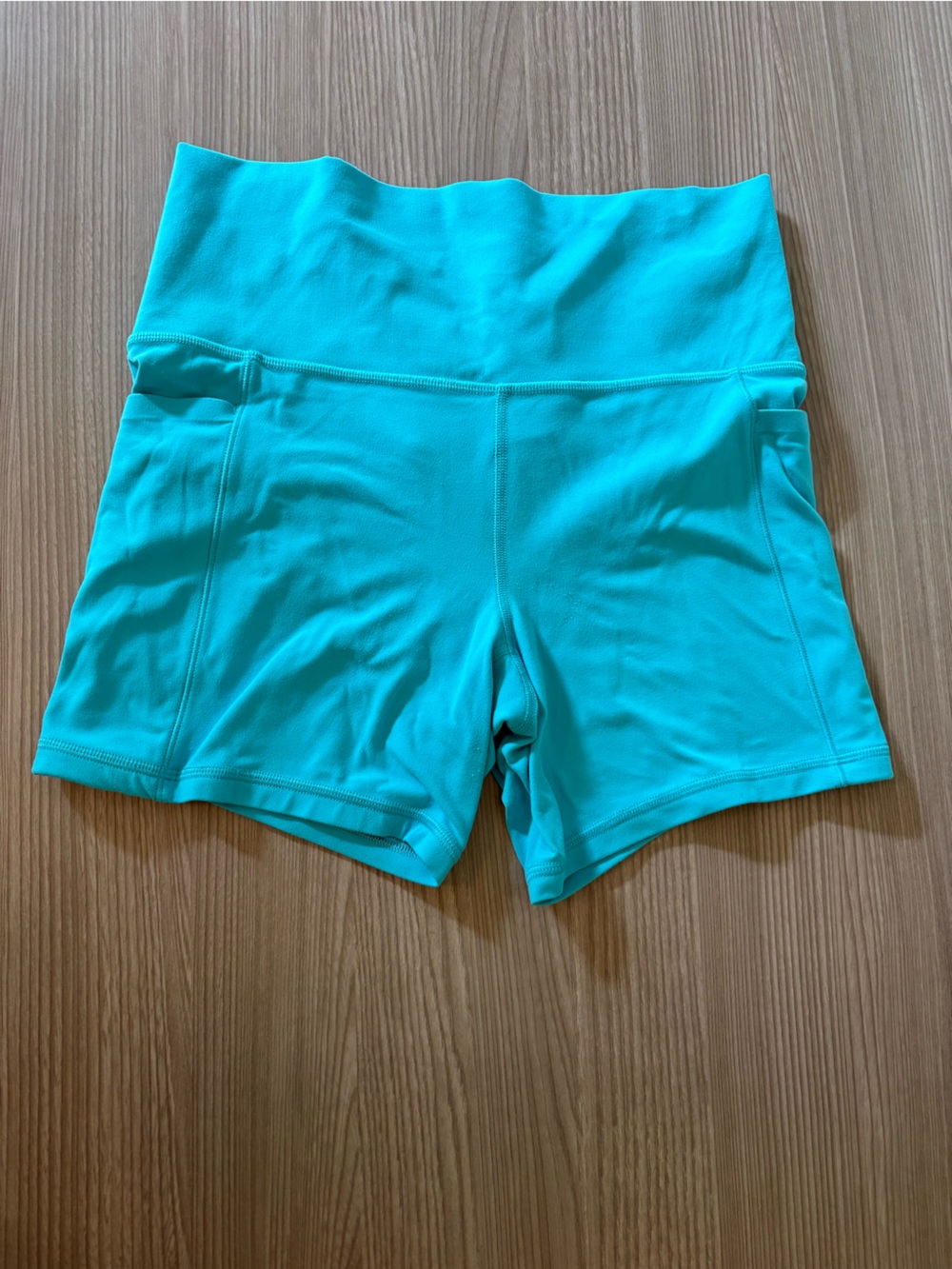 Athleta Turquoise Salutation Stash 5” Shorts